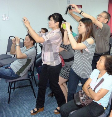 Taking notes and pictures on the important information on Mobile Number Reading and Business Card Reading